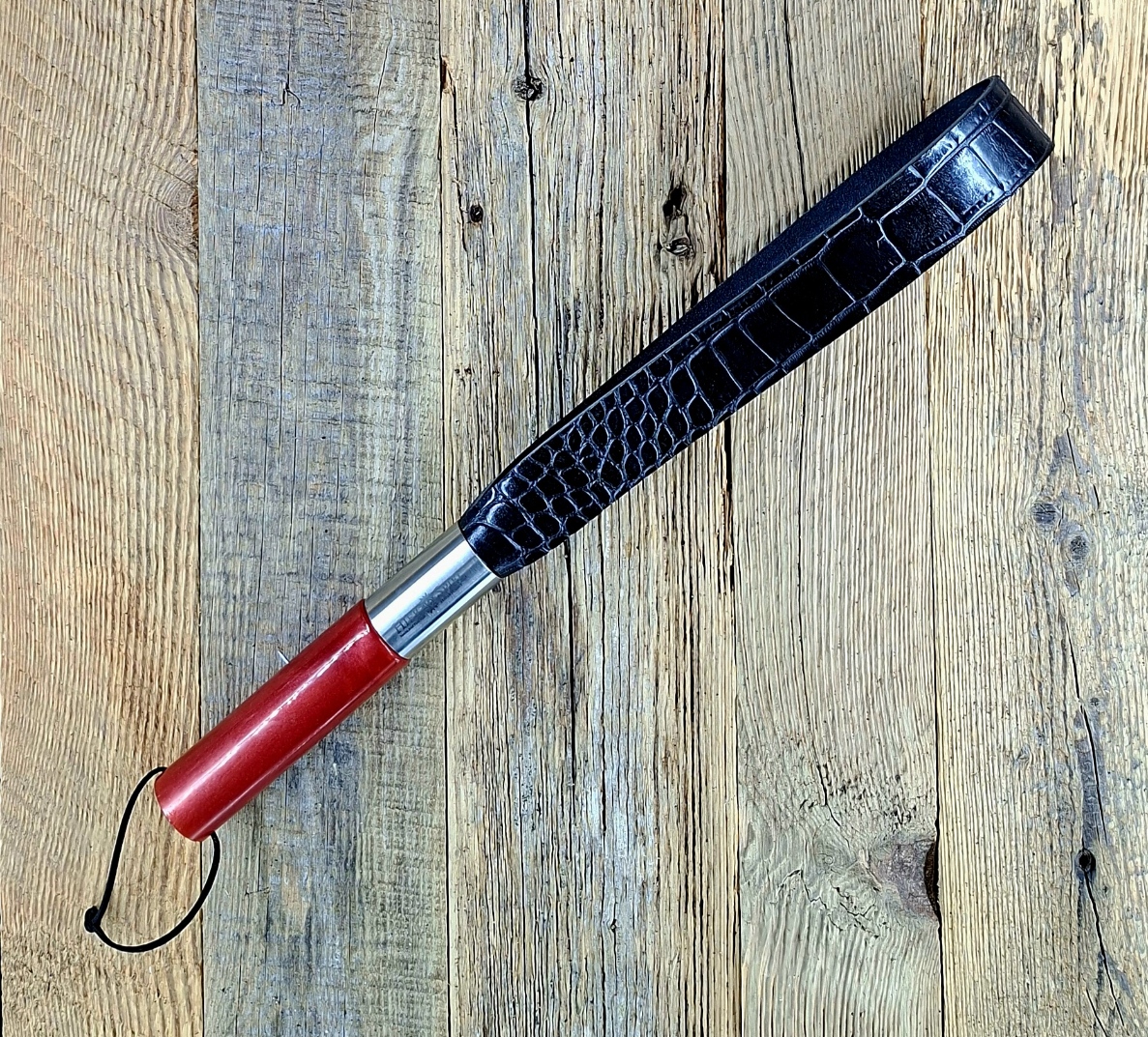 Gemeine Klatsche aus sehr festem Leder (Kroko)