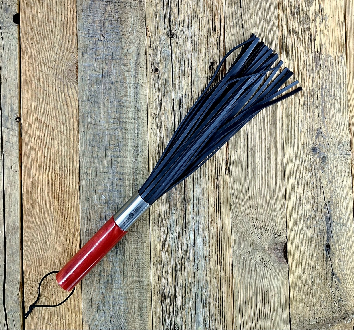 Sehr fieser Gummiflogger mit Vierkantgummiriemen